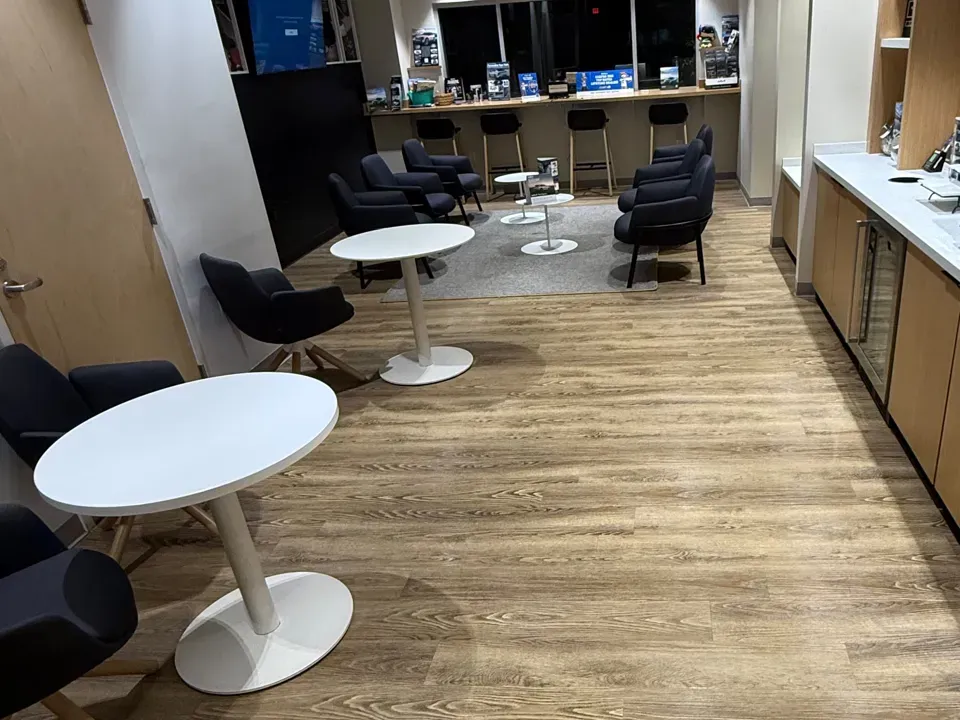 Customer lounge cleaned by Golden Cleaning Services at a car dealership