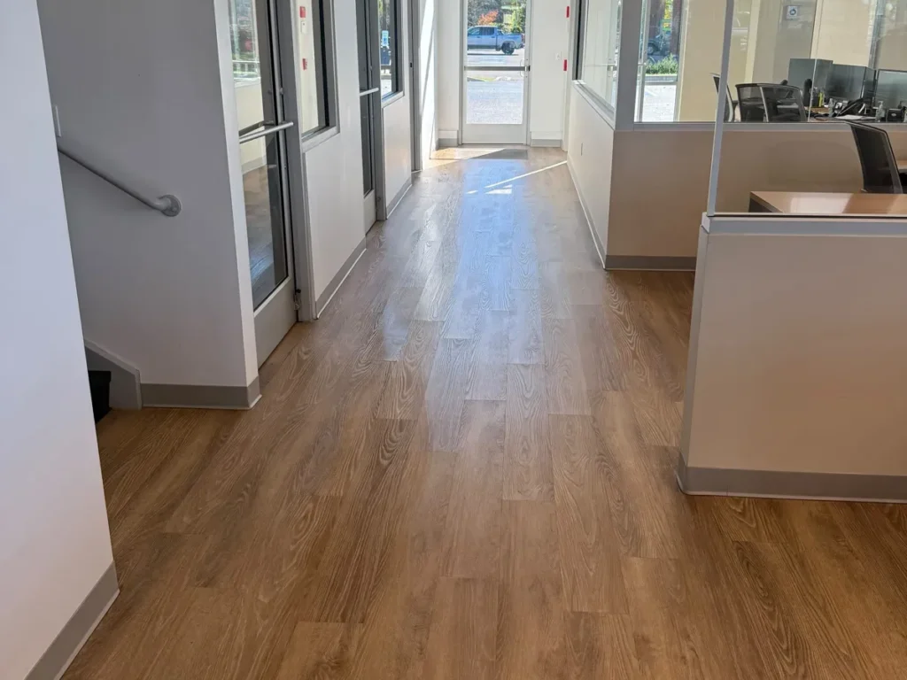 Dealership office hallway with freshly cleaned floors